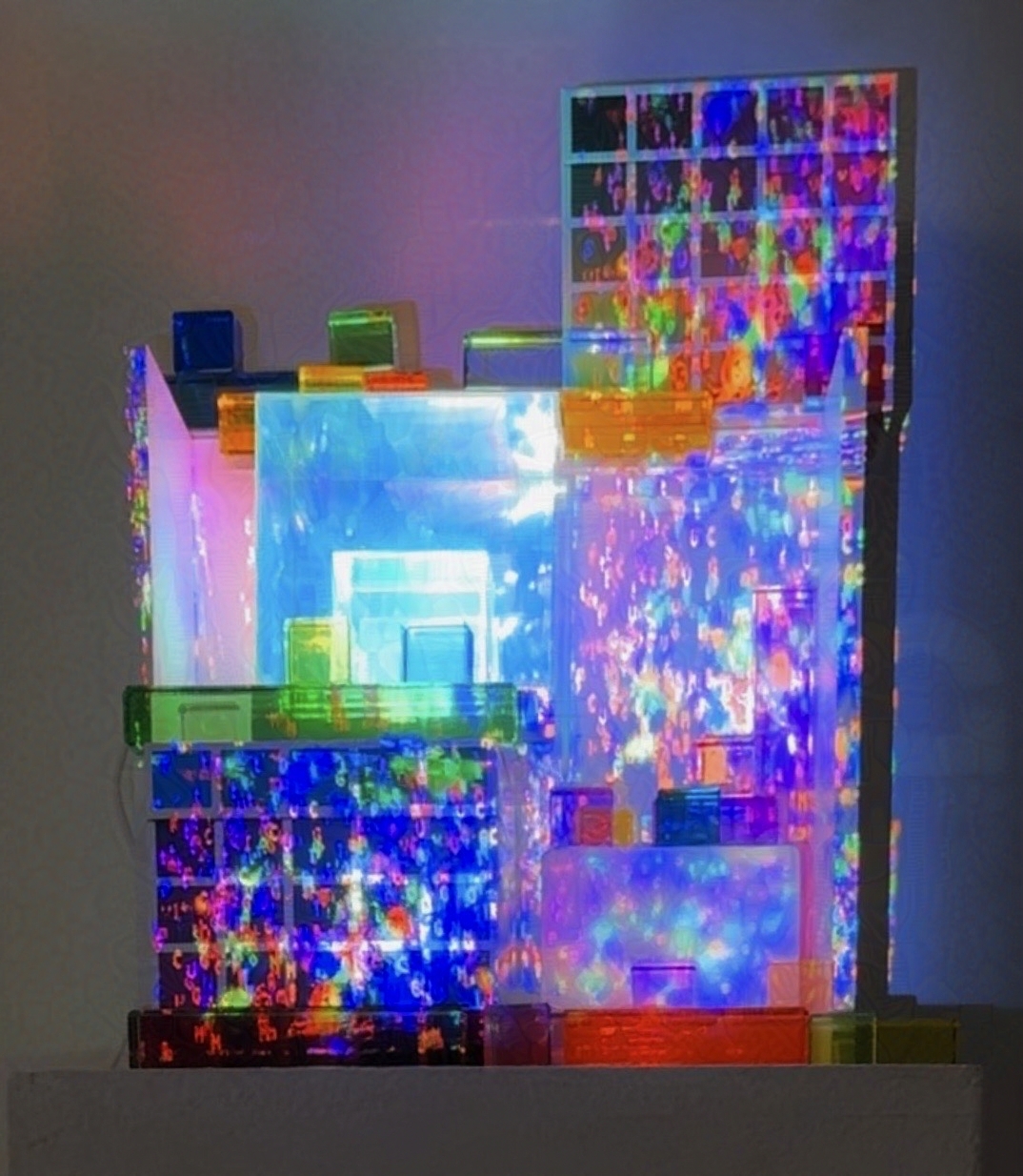 Content (2025). Projection art on acrylic cubes and colored cardboard boxes. 12 × 12 × 12 inches. For Intermediate New Media. 
